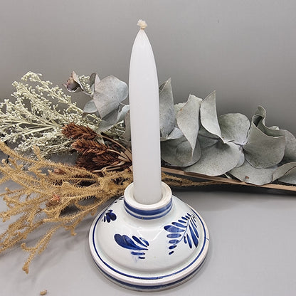 Dutch Delft inspired blue and white ceramic candle holder with cobalt floral design.