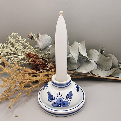 Dutch Delft inspired blue and white ceramic candle holder with cobalt floral design.