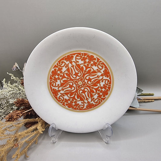 Royal Doulton Seville plate with orange and gold ornate central design.