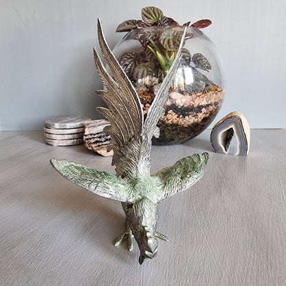 Metal rooster figurine with green patina, raised wings and detailed feathers, Japanese decor.