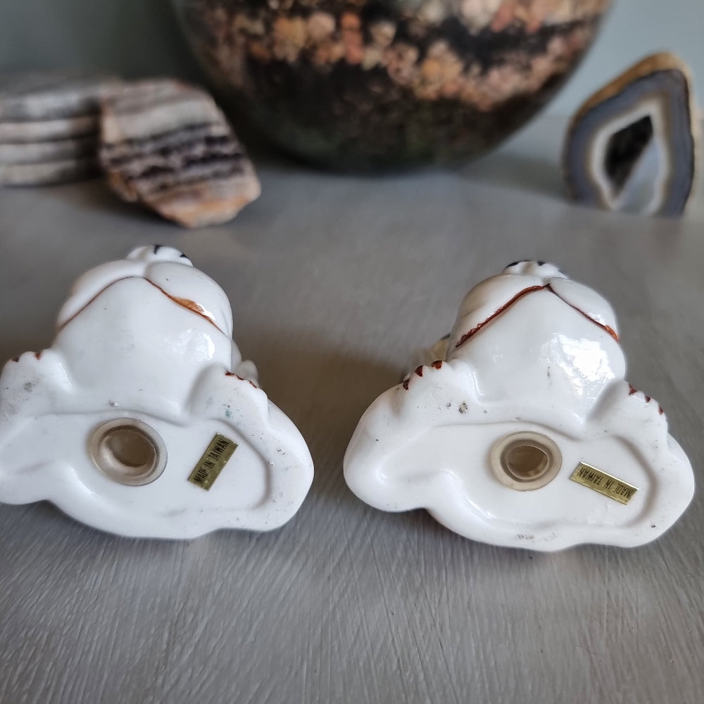 Vintage hound dog salt and pepper shakers made in Taiwan with droopy eyes and brown glaze.