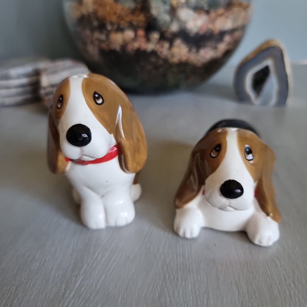Pair of vintage ceramic beagle salt and pepper shakers with red collars.