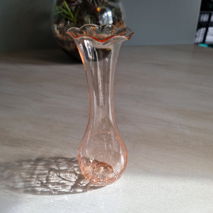 Vintage pink crackle glass bud vase with ruffled rim and soft blush tone.