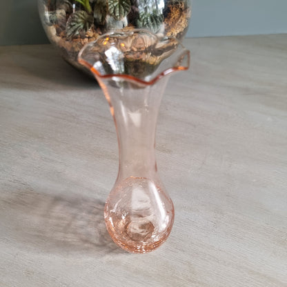 Vintage pink crackle glass bud vase with ruffled rim and soft blush tone.