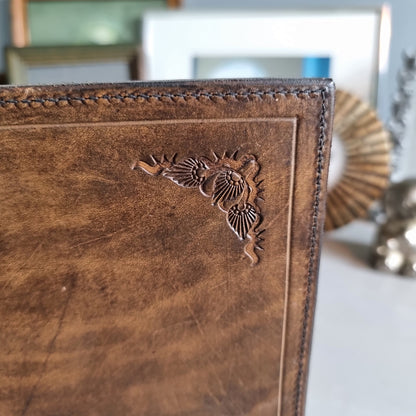 Vintage tan leather double photo frame with embossed detailing