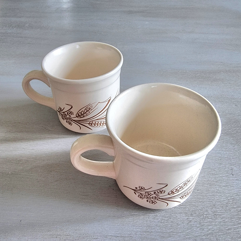 Pair of Biltons England stoneware mugs with brown wheat and berry design.