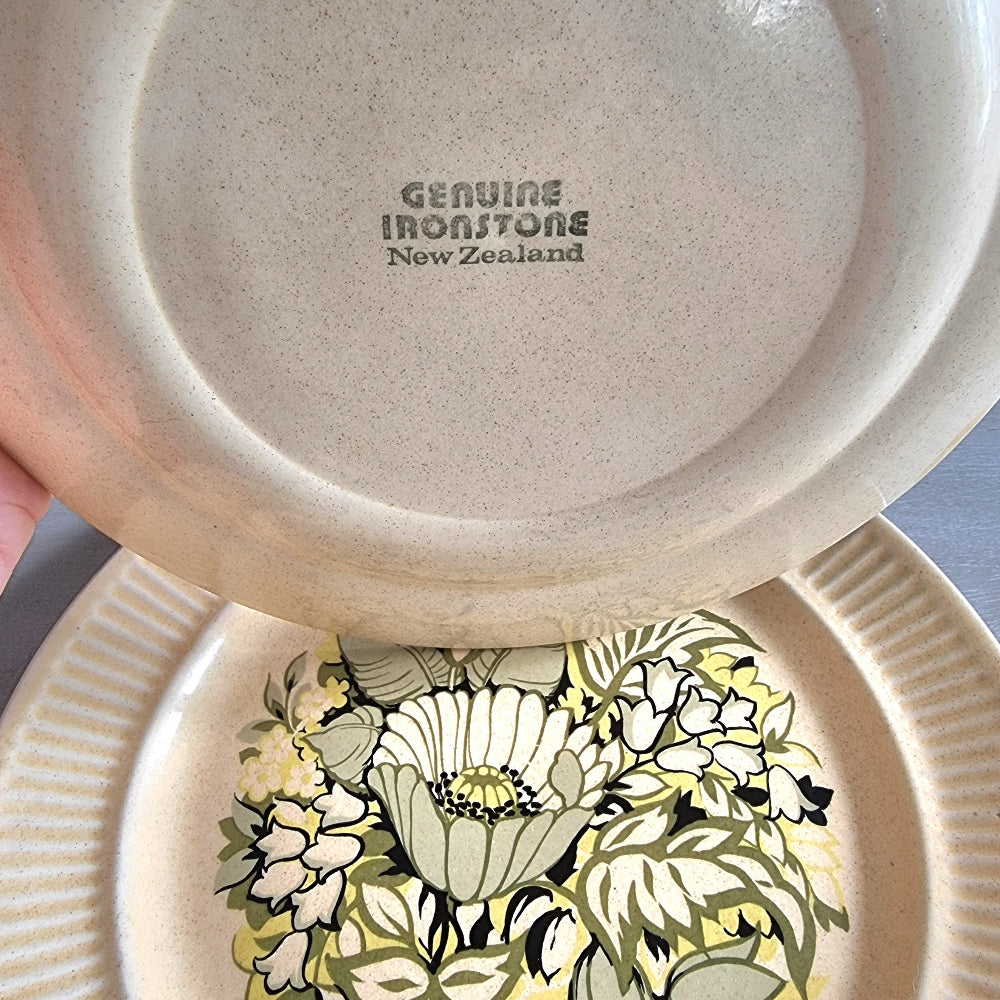 Pair of Genuine Ironstone NZ plates with ribbed rims and green-yellow floral centre design.