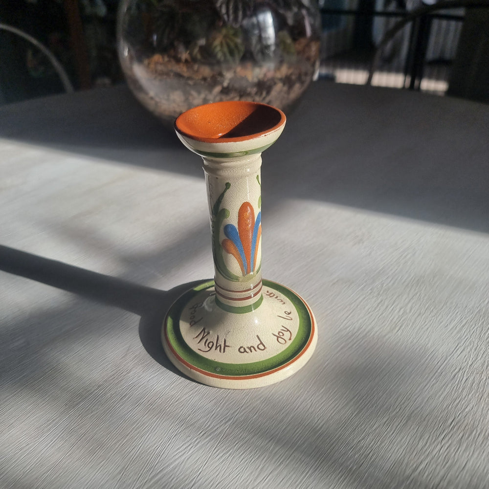 Torquay Motto Ware ceramic candle holder with “Good night and joy be with you” inscription.