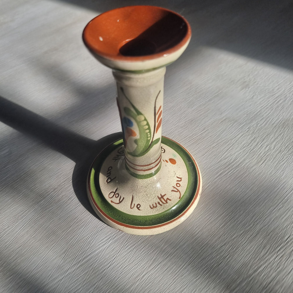 Torquay Motto Ware ceramic candle holder with “Good night and joy be with you” inscription.