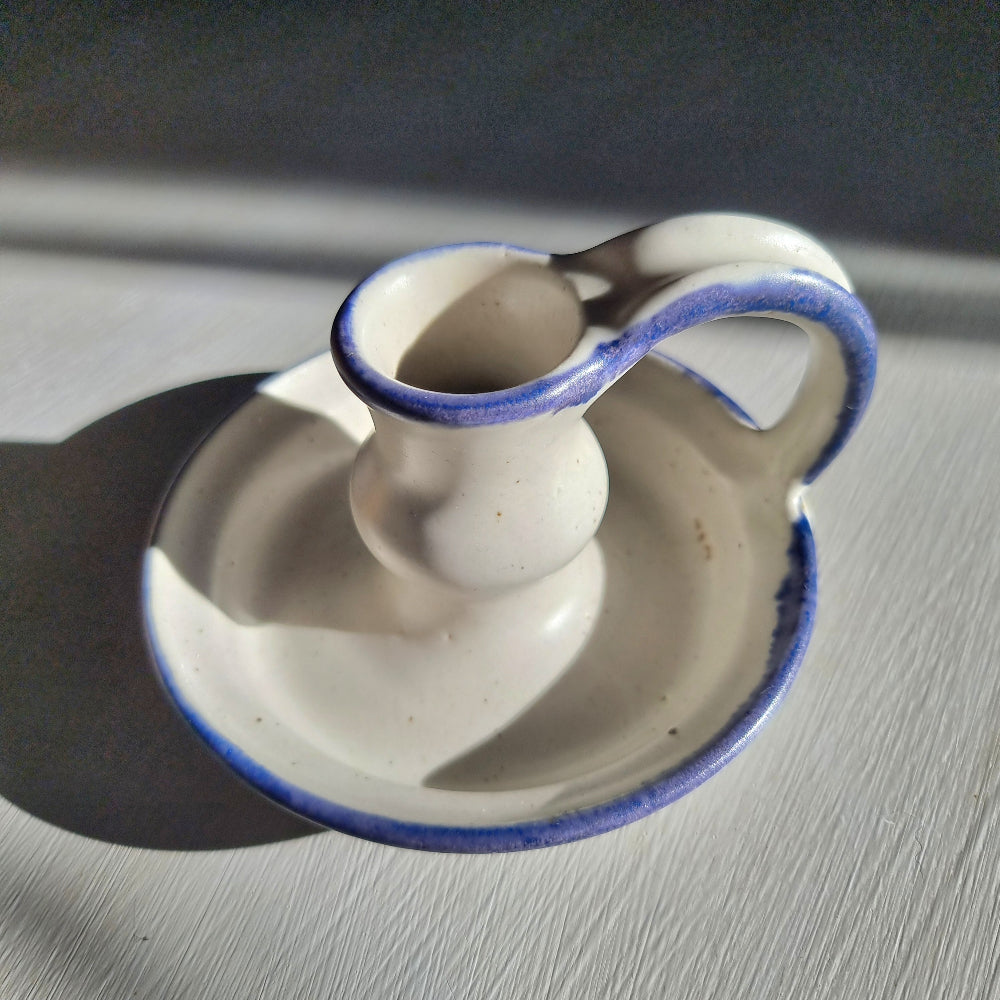 New Zealand stoneware chamberstick by Thelma Lamont Pottery with blue dripped glaze rim