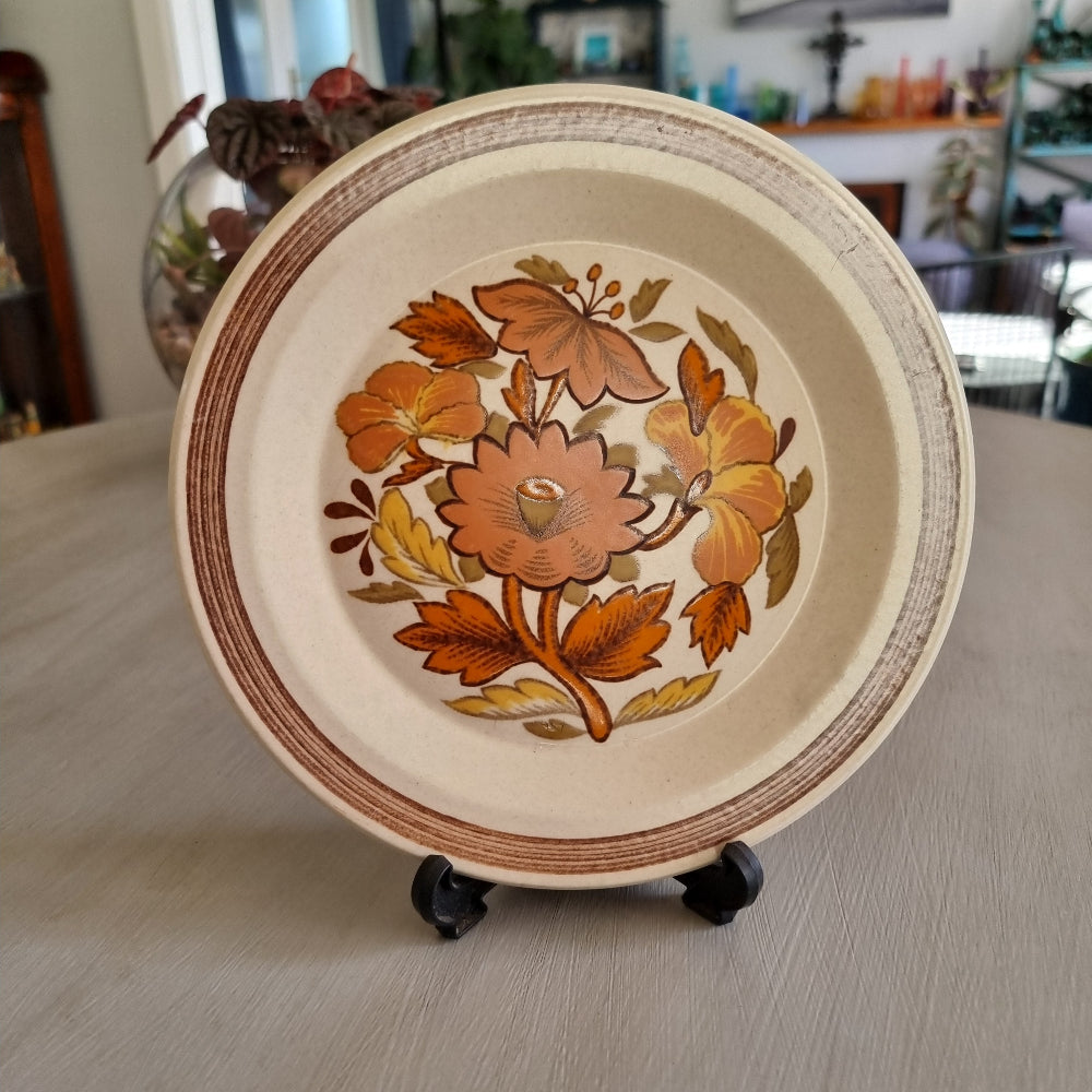 Royal Worcester Palissy Kismet plate with orange floral motif and brown rim detail