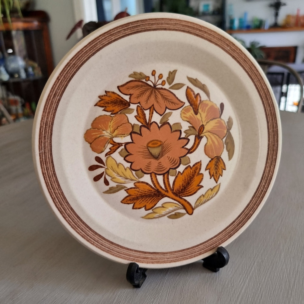 Royal Worcester Palissy Kismet plate with orange floral motif and brown rim detail