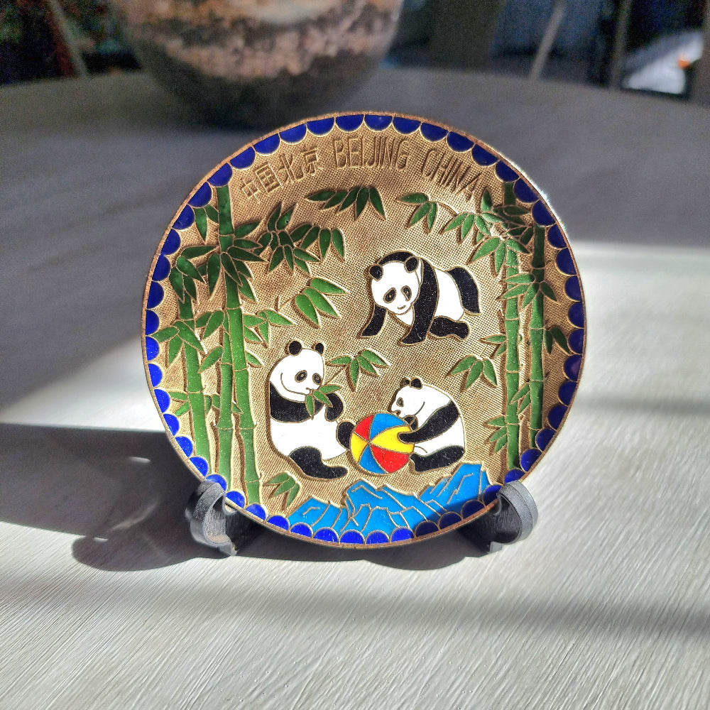 Brass dish with colourful enamel pandas playing among bamboo labelled Beijing China