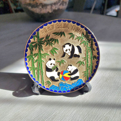 Brass dish with colourful enamel pandas playing among bamboo labelled Beijing China