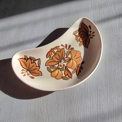 Vintage Palissy Kismet pottery serving dish with brown floral pattern and curved crescent shape