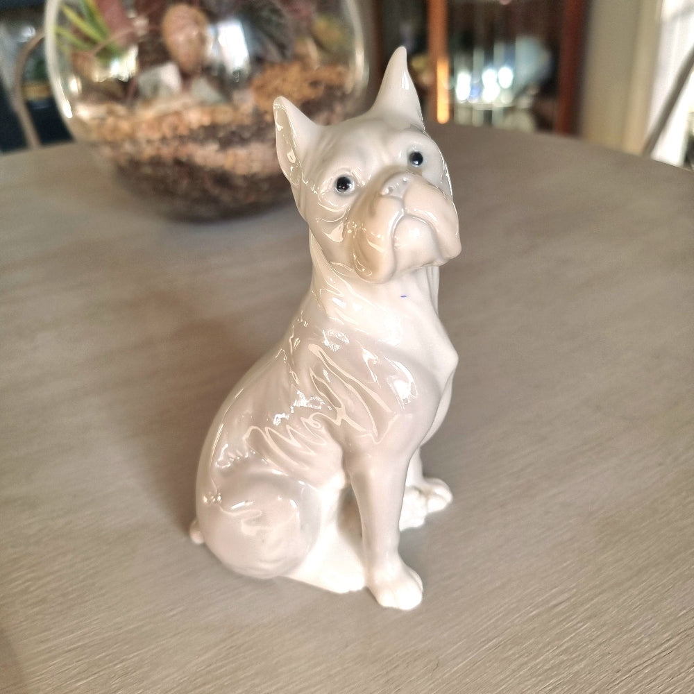 Vintage porcelain French Bulldog figurine in glossy white glaze seated upright with bat ears and wrinkled snout