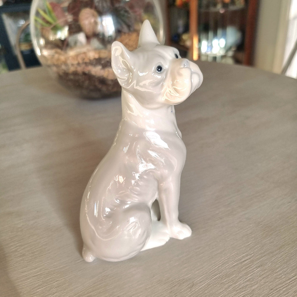 Vintage porcelain French Bulldog figurine in glossy white glaze seated upright with bat ears and wrinkled snout