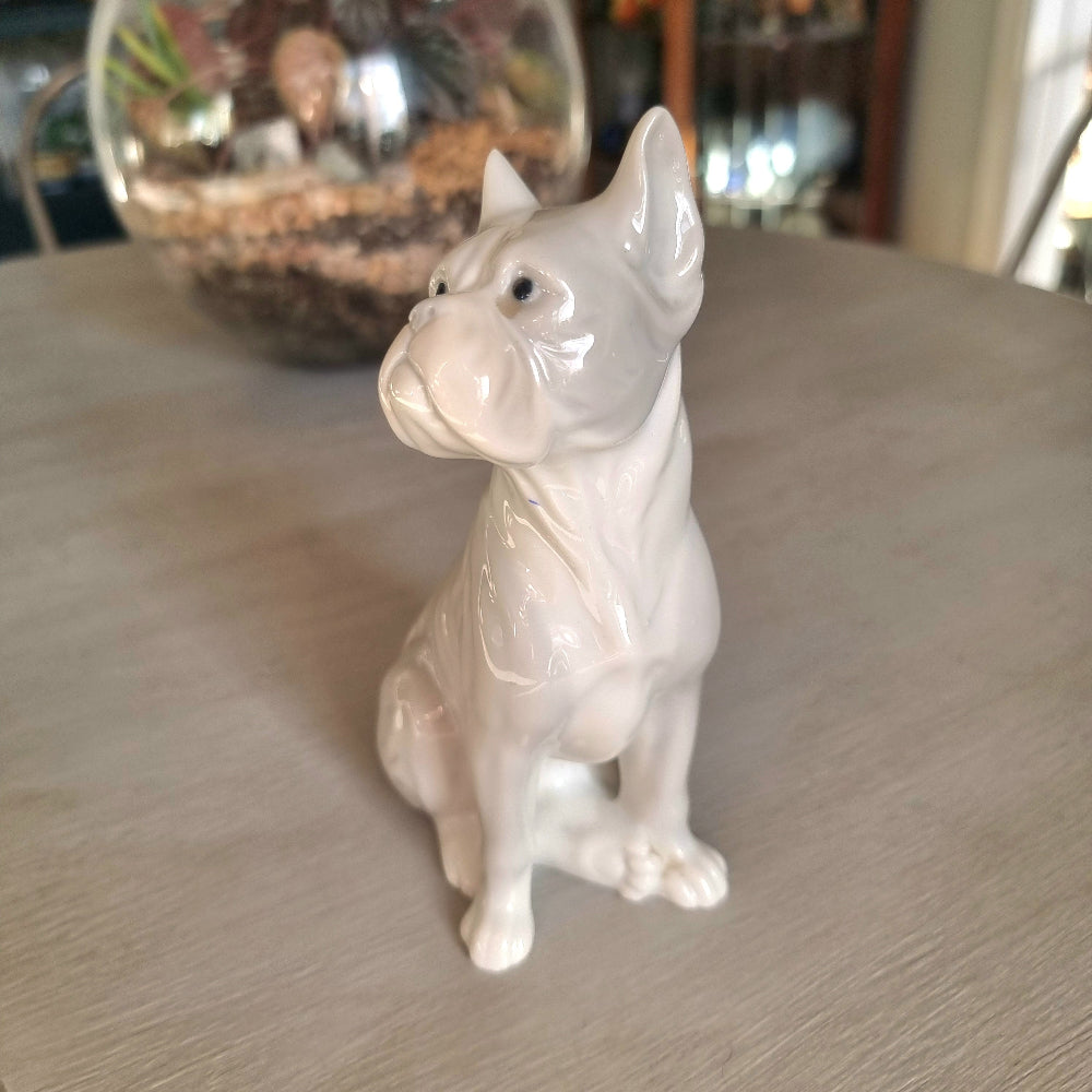 Vintage porcelain French Bulldog figurine in glossy white glaze seated upright with bat ears and wrinkled snout