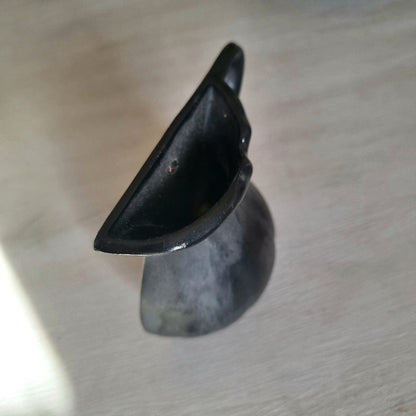 Vintage ceramic wall pocket planter with a dramatic black, bronze and silver lustre glaze