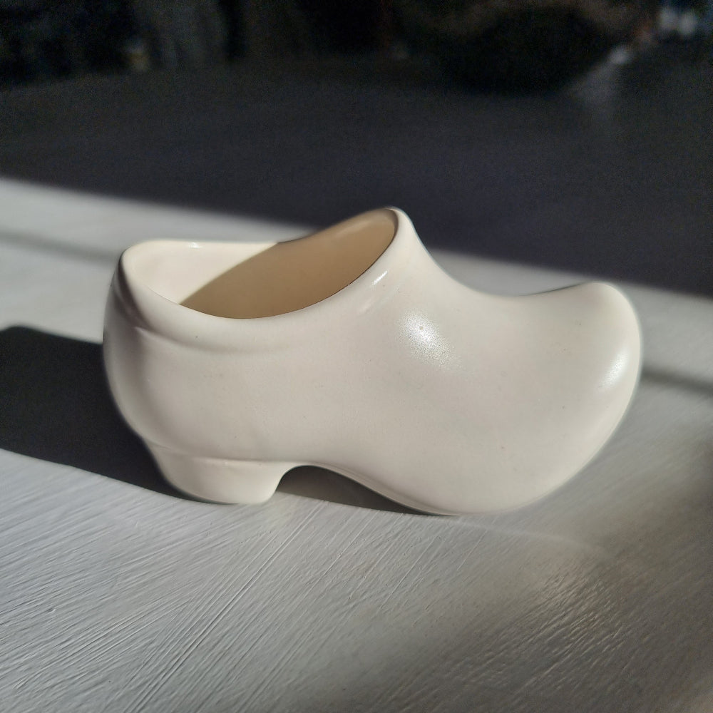 Vintage Shorter and Son ceramic clog planter in cream glaze shaped like a wooden shoe