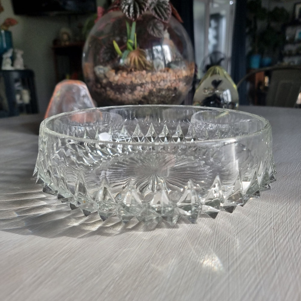 Pressed glass diamond point bowl set with one large and two small bowls, sparkling in natural light