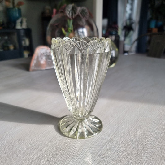 Clear depression glass vase with scalloped rim and fluted art deco design