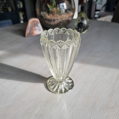 Clear depression glass vase with scalloped rim and fluted art deco design