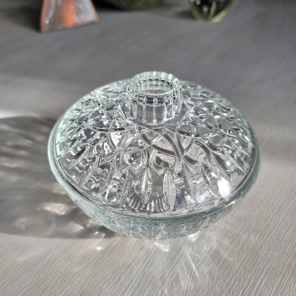 Pasari glass trinket dish with lid featuring pressed floral pattern and clear glass finish