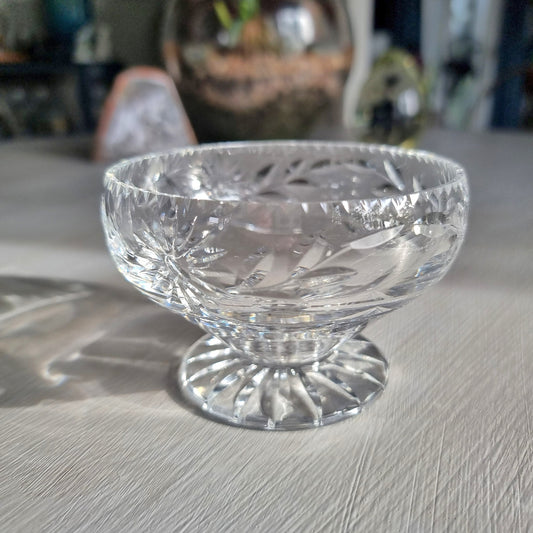 Cut crystal pedestal bowl with etched floral and leaf design and scalloped rim
