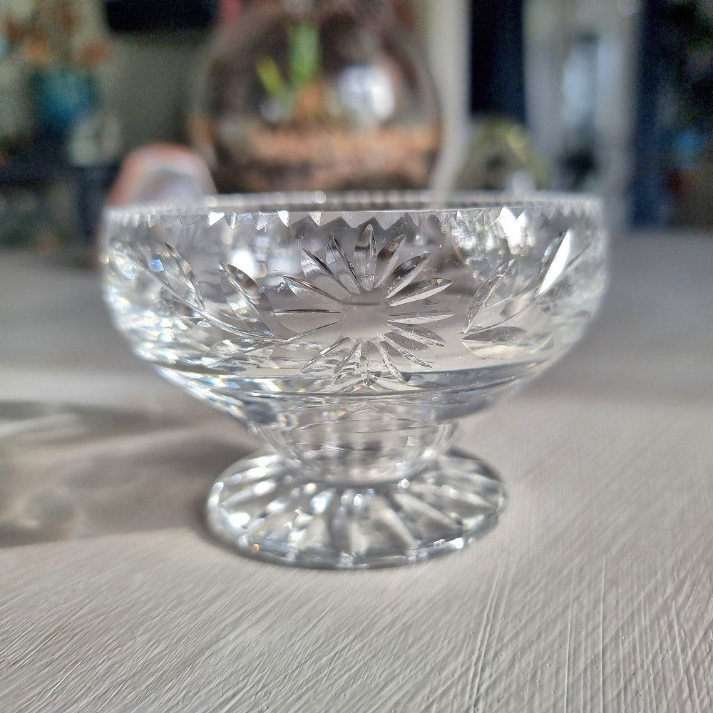 Cut crystal pedestal bowl with etched floral and leaf design and scalloped rim