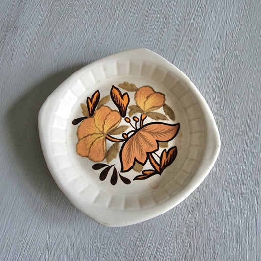 Small vintage Palissy trinket dish with brown floral pattern on cream ceramic