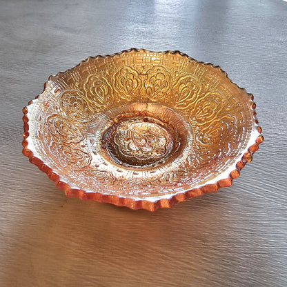 Vintage Fenton Persian Medallion carnival glass bowl with peach iridescent finish and ornate paisley pattern.
