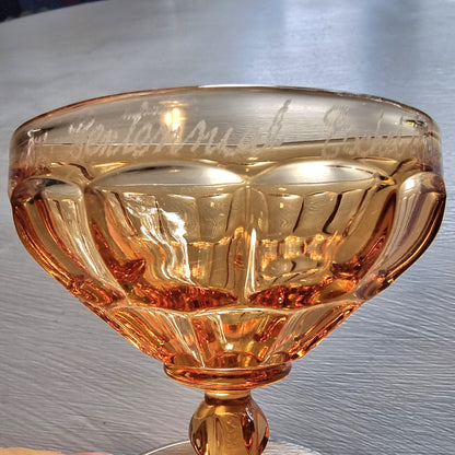 Vintage amber pedestal glass engraved with NZ Centennial Exhibition 1940 inscription and faceted bowl design.