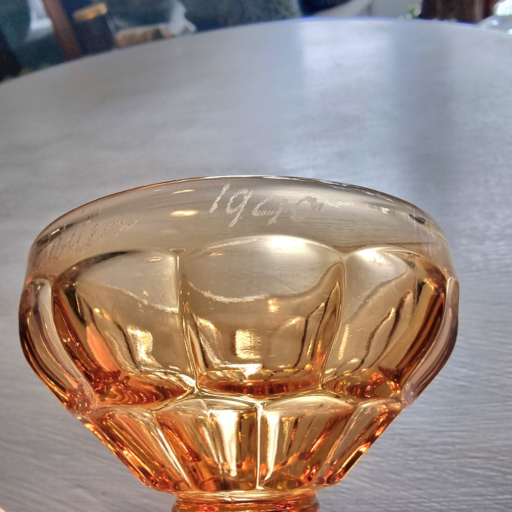 Vintage amber pedestal glass engraved with NZ Centennial Exhibition 1940 inscription and faceted bowl design.