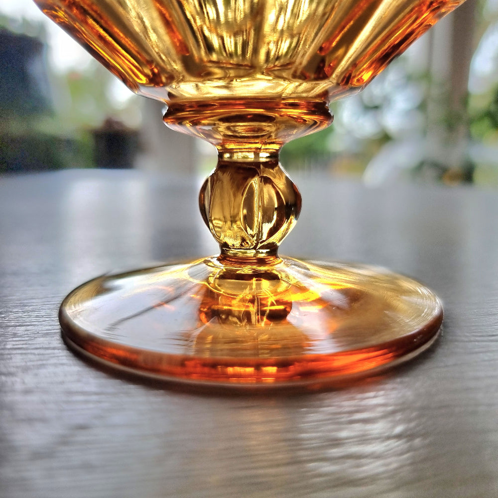 Vintage amber pedestal glass engraved with NZ Centennial Exhibition 1940 inscription and faceted bowl design.
