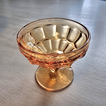 Vintage amber pedestal glass engraved with NZ Centennial Exhibition 1940 inscription and faceted bowl design.