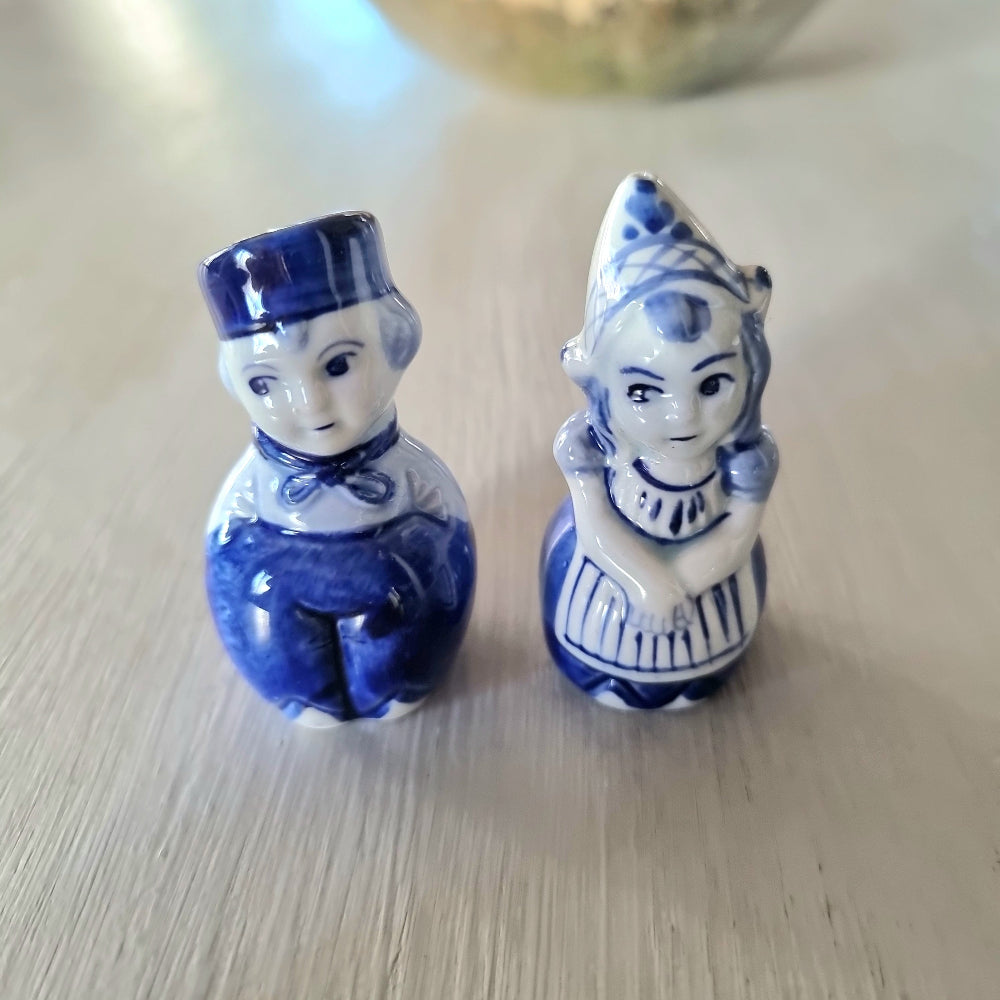 Vintage Delft-style blue and white Dutch boy and girl salt and pepper shaker set