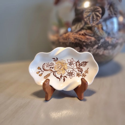 Vintage hand painted ceramic trinket dish by Lyn Bone with yellow rose and floral design on wavy edged oval dish