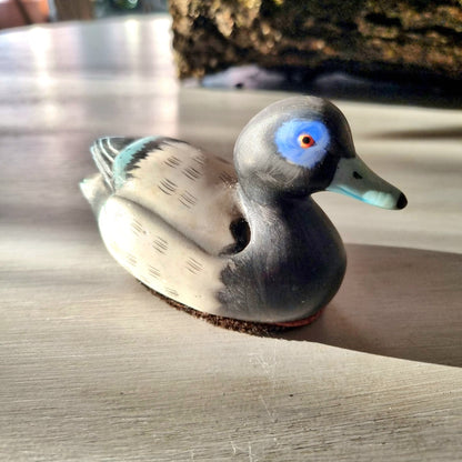 Jasco ceramic duck lint brush with bristle base and blue-ringed eye detail