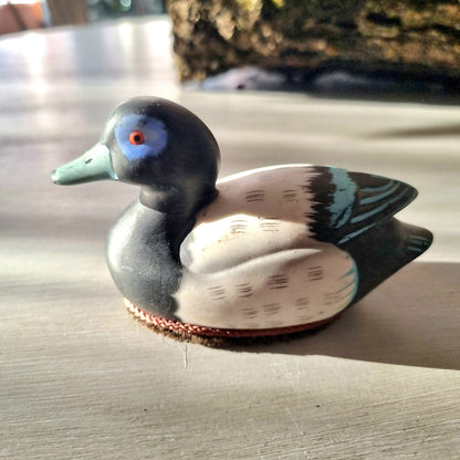Jasco ceramic duck lint brush with bristle base and blue-ringed eye detail