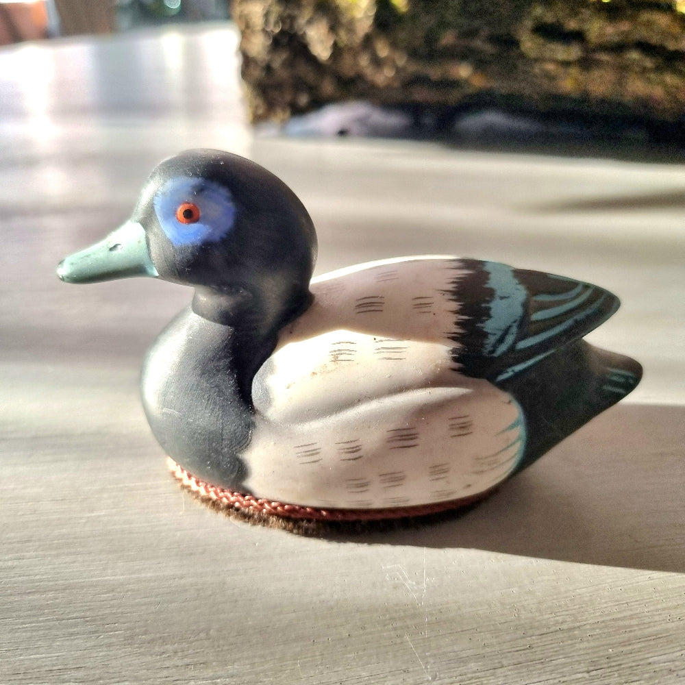Jasco ceramic duck lint brush with bristle base and blue-ringed eye detail