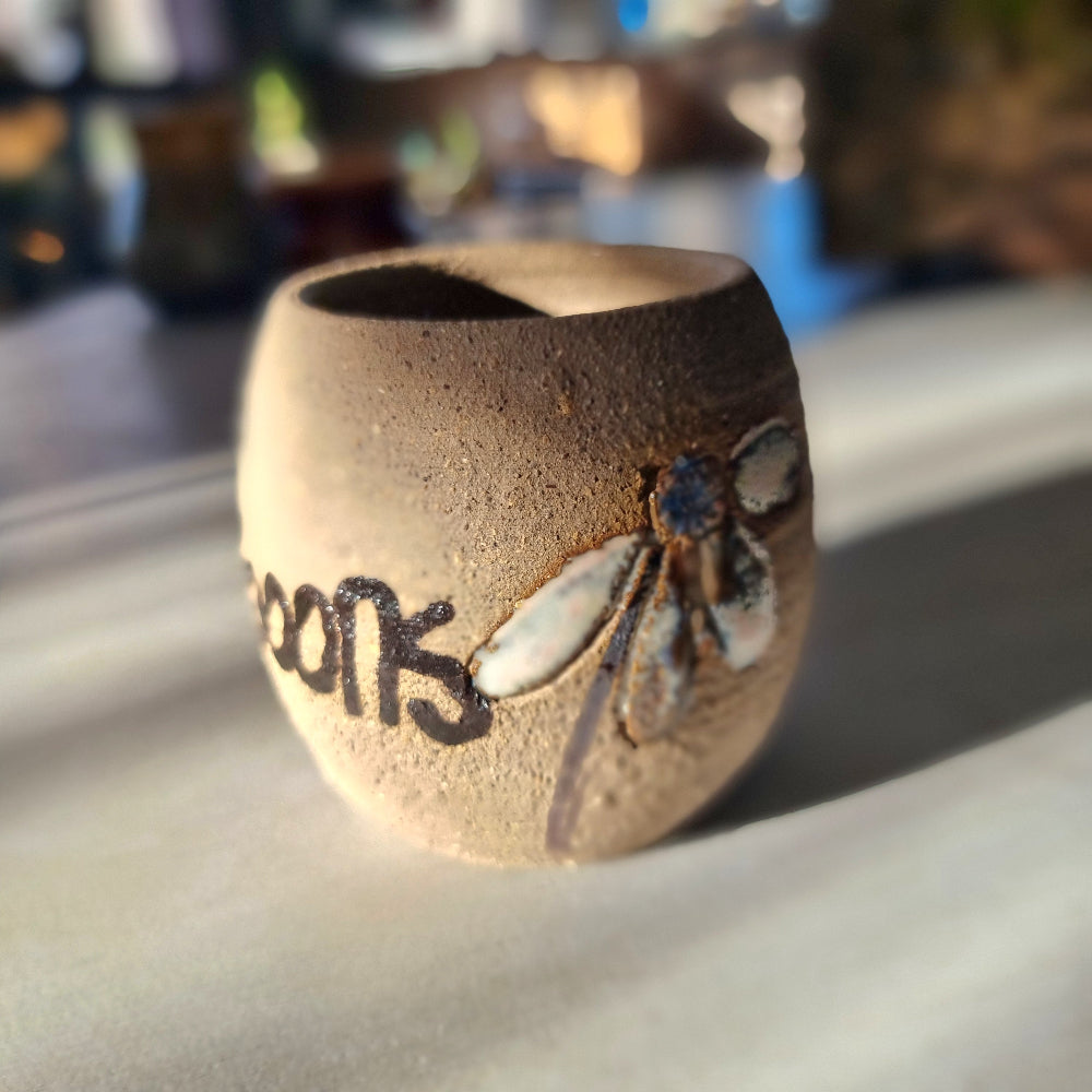 Handmade pottery "Spoons" pot with hand-painted lettering and floral detail