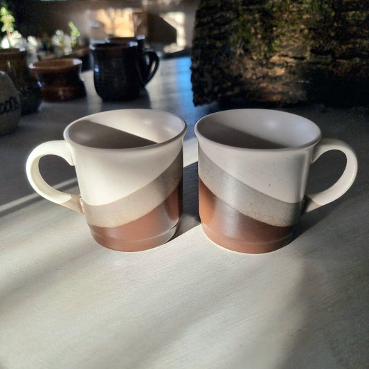 Pair of retro mugs with white, grey and terracotta diagonal colour block design