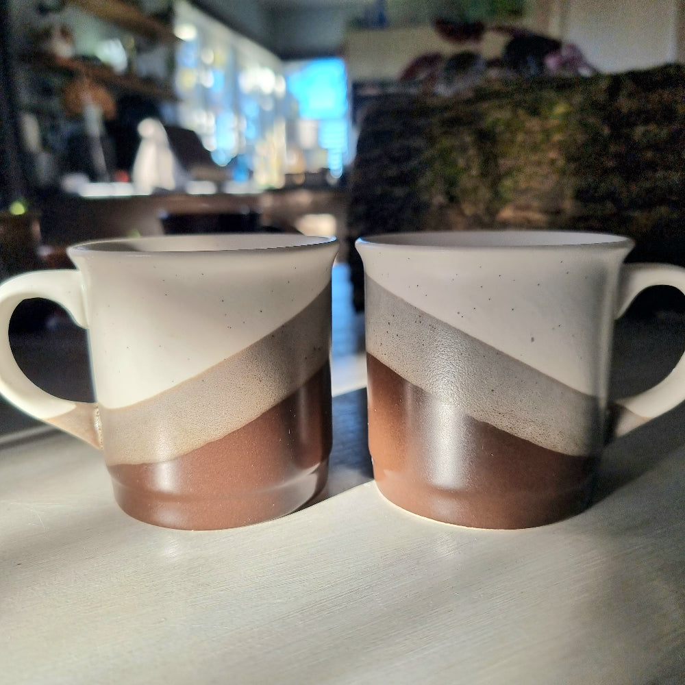 Pair of retro mugs with white, grey and terracotta diagonal colour block design