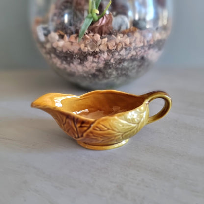 Vintage Royal Winton amber leaf-design gravy boat with backstamp, made in England