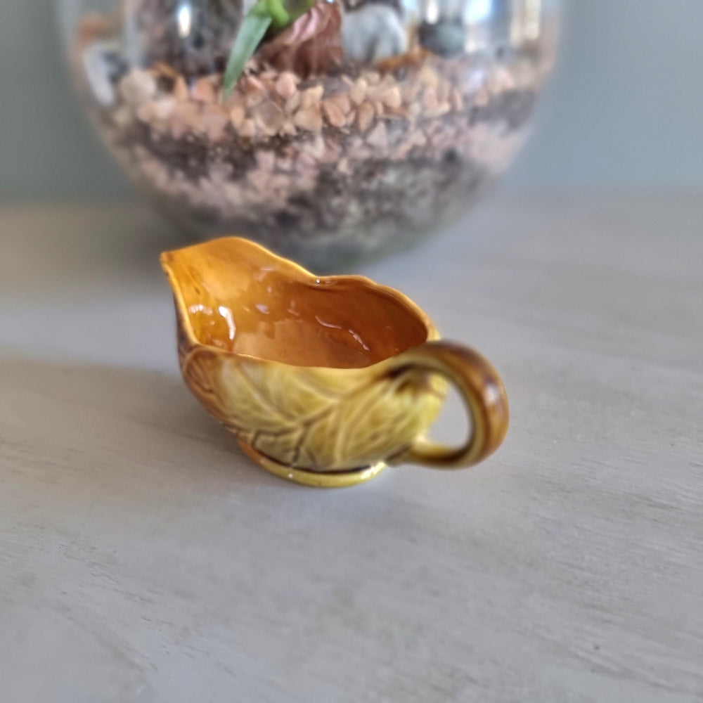 Vintage Royal Winton amber leaf-design gravy boat with backstamp, made in England