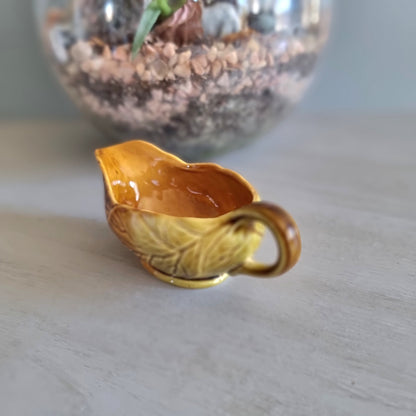 Vintage Royal Winton amber leaf-design gravy boat with backstamp, made in England