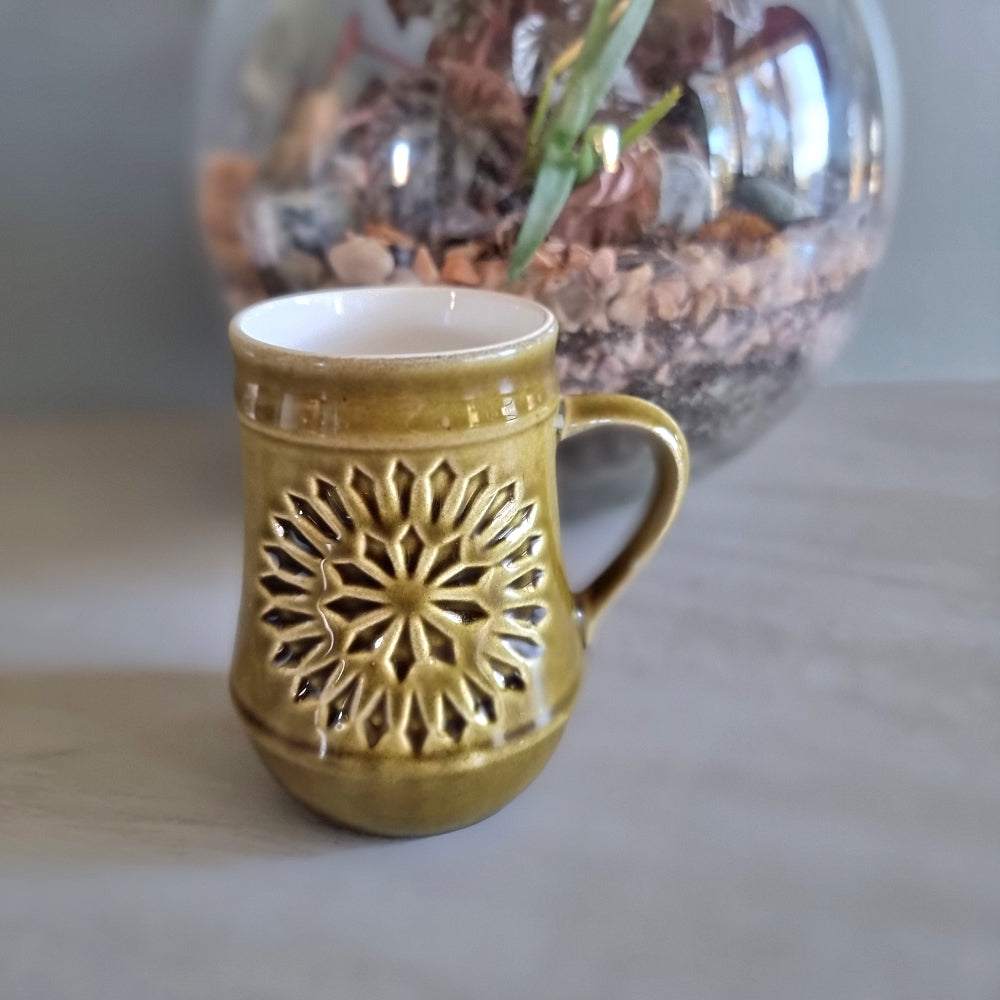 Vintage green Celtic Irish Fine Earthenware mug with pierced sunburst design