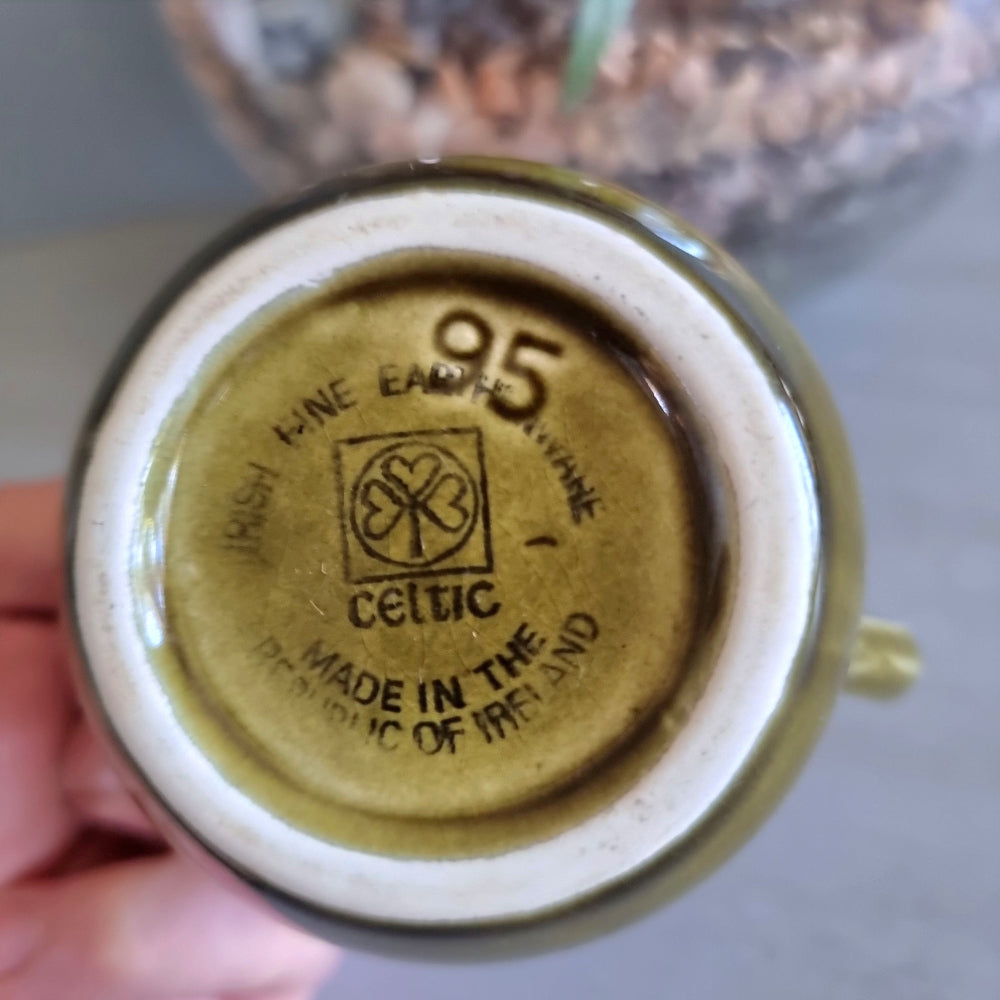 Vintage green Celtic Irish Fine Earthenware mug with pierced sunburst design