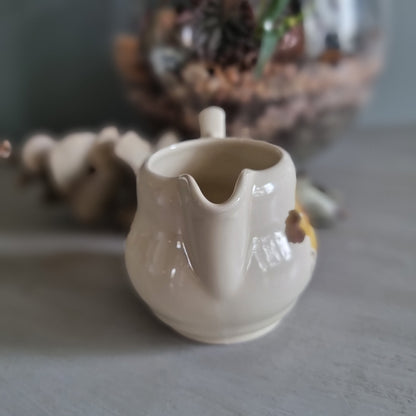 Vintage Cambridge ceramic creamer jug with golden rose design